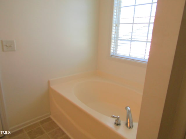 bathroom featuring a garden tub