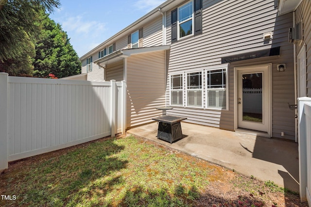 exterior space featuring a patio and fence