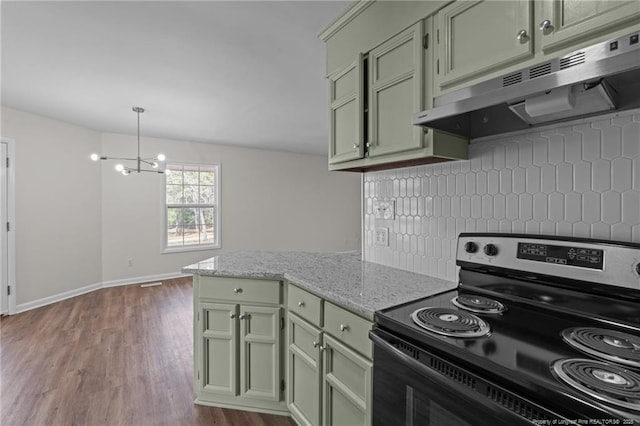 kitchen with green cabinetry, range with electric stovetop, wood finished floors, and under cabinet range hood