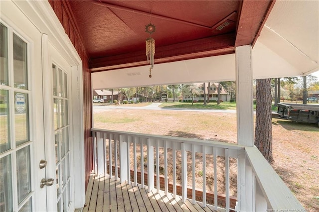 deck featuring french doors and covered porch
