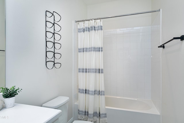 full bath with vanity, toilet, and shower / tub combo