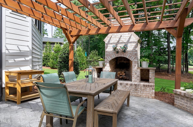 view of patio / terrace with outdoor dining space, a pergola, and an outdoor brick fireplace