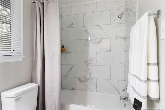 full bathroom featuring toilet and shower / tub combo