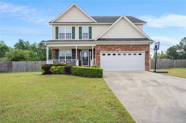 view of front of property featuring fence, a front yard, brick siding, a porch, and driveway