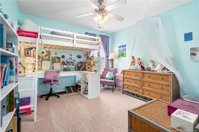 bedroom featuring ceiling fan, carpet flooring, and visible vents