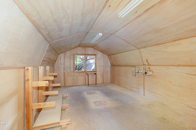 additional living space featuring vaulted ceiling and wooden ceiling