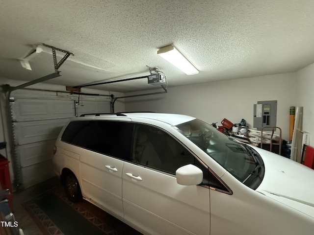 1454-17 Cimarron Pkwy, Wake Forest, NC 27587 - garage with a garage door opener and electric panel