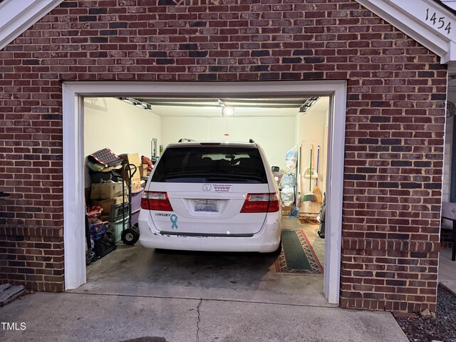 1454-17 Cimarron Pkwy, Wake Forest, NC 27587 - garage featuring concrete driveway