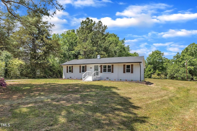 ranch-style home with a front yard