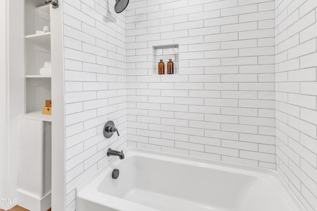full bath featuring  shower combination