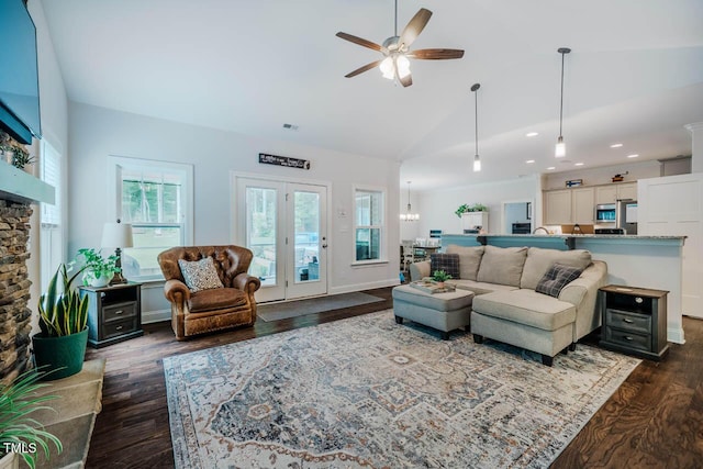 4072 Mackenzie Dr, Haw River, NC 27258 - living room featuring a stone fireplace, dark wood finished floors, a ceiling fan, recessed lighting, and a chandelier
