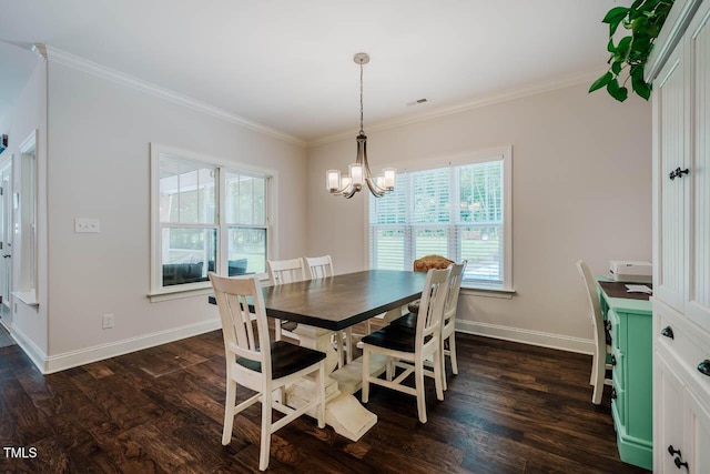 4072 Mackenzie Dr, Haw River, NC 27258 - dining space with a chandelier, dark wood-type flooring, baseboards, and ornamental molding