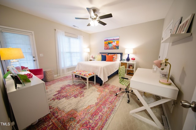 bedroom with visible vents and a ceiling fan