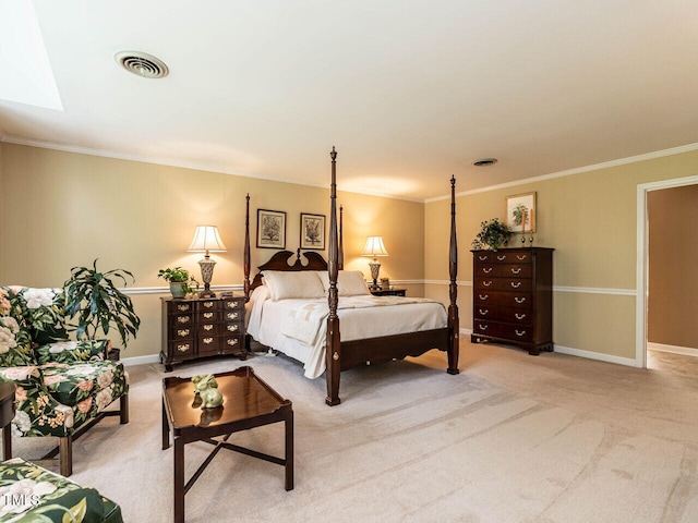 bedroom with crown molding, light carpet, baseboards, a skylight, and visible vents