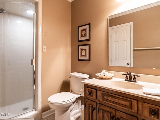 full bath featuring vanity, toilet, and a shower stall