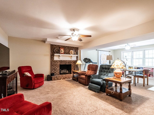 carpeted living area featuring a ceiling fan and a brick fireplace