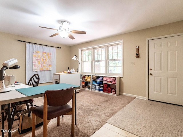 recreation room featuring baseboards, a ceiling fan, and carpet flooring