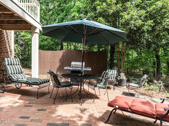 view of patio / terrace with fence and outdoor dining space