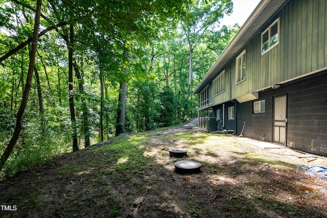 5213 Tomahawk Trl, Raleigh, NC 27610 - view of yard featuring central AC unit