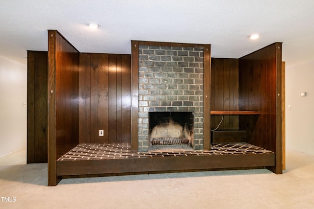 5213 Tomahawk Trl, Raleigh, NC 27610 - unfurnished living room with carpet, a sauna, a brick fireplace, and wooden walls