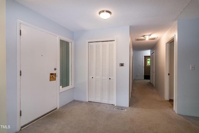 5213 Tomahawk Trl, Raleigh, NC 27610 - corridor with light carpet