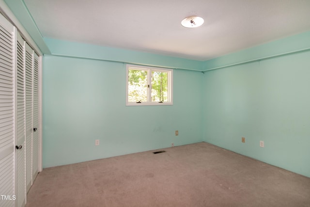 5213 Tomahawk Trl, Raleigh, NC 27610 - unfurnished bedroom featuring carpet and a closet