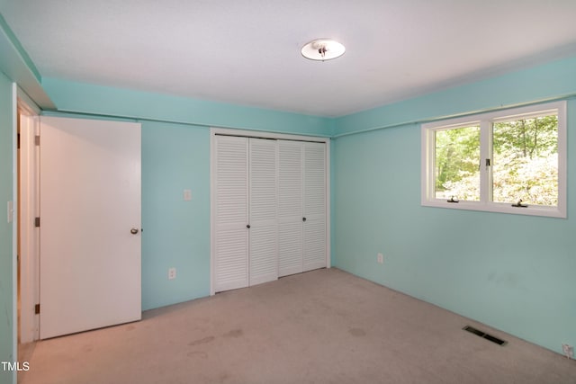 5213 Tomahawk Trl, Raleigh, NC 27610 - unfurnished bedroom with carpet flooring and a closet