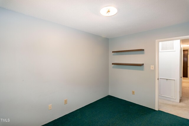5213 Tomahawk Trl, Raleigh, NC 27610 - spare room featuring carpet