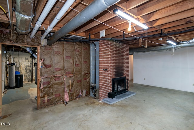 5213 Tomahawk Trl, Raleigh, NC 27610 - unfinished below grade area featuring a fireplace