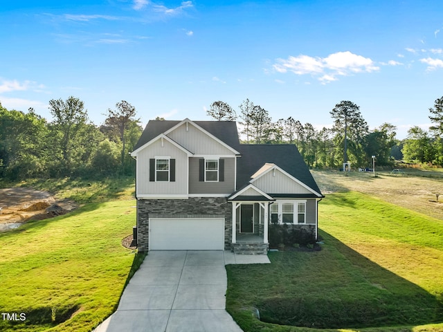 craftsman inspired home featuring a front yard, an attached garage, stone siding, and driveway