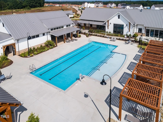 104 Lingonberry Dr, Holly Springs, NC 27540 - pool with fence, a residential view, and a patio area