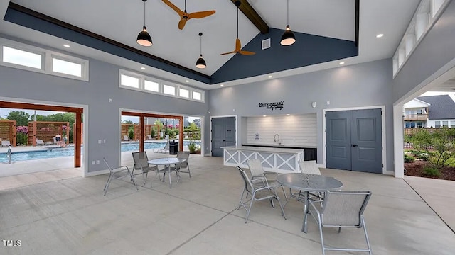 104 Lingonberry Dr, Holly Springs, NC 27540 - view of patio / terrace with visible vents, ceiling fan, outdoor dining area, a community pool, and a sink