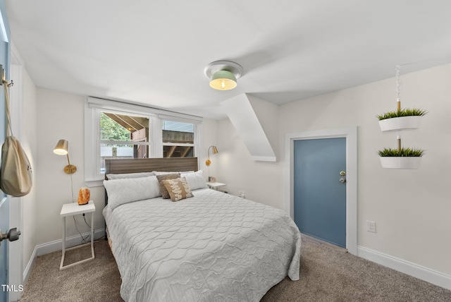 carpeted bedroom with baseboards