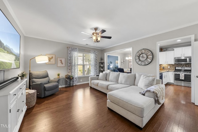 living area with crown molding, a ceiling fan, and dark wood-type flooring
