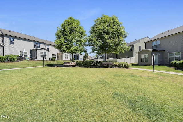 view of yard featuring a residential view