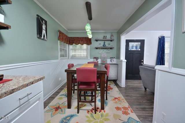 114 Short St E, Hillsborough, NC 27278 - dining area featuring crown molding, wood finished floors, and a wainscoted wall