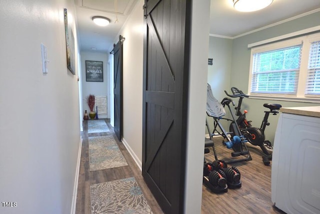 114 Short St E, Hillsborough, NC 27278 - corridor featuring baseboards, ornamental molding, dark wood-style floors, and a barn door