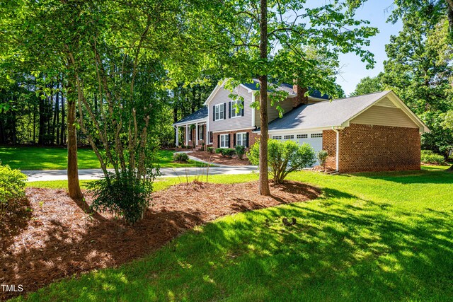 exterior space featuring concrete driveway and a garage