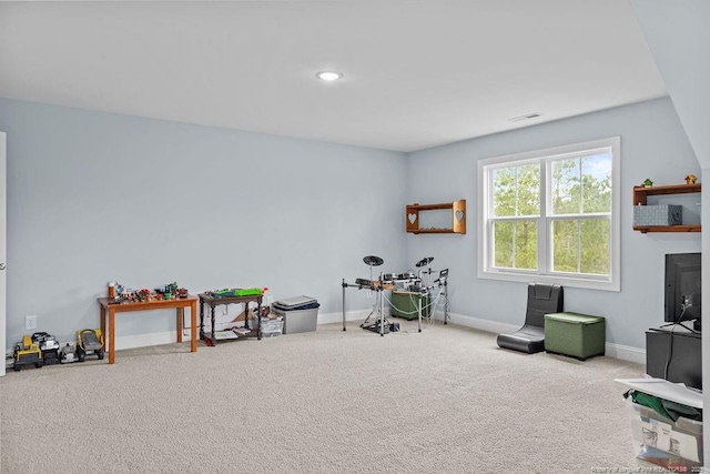 recreation room featuring carpet flooring, recessed lighting, baseboards, and visible vents