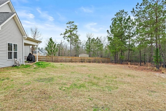 view of yard with fence