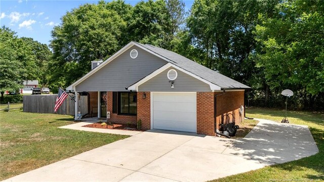 ranch-style house with fence, a front lawn, brick siding, a garage, and concrete driveway