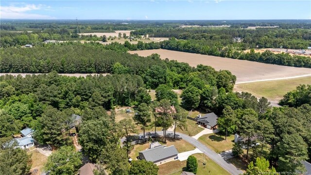 aerial view featuring a forest view