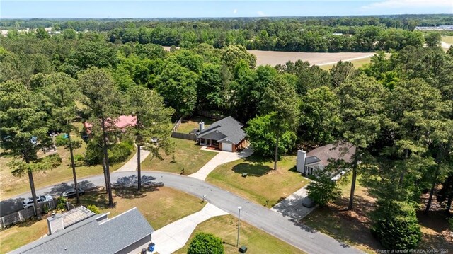 aerial view featuring a view of trees