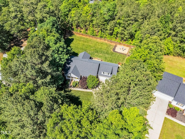 76 Bergeson Ct, Fuquay Varina, NC 27526 - aerial view of property and surrounding area featuring a heavily wooded area