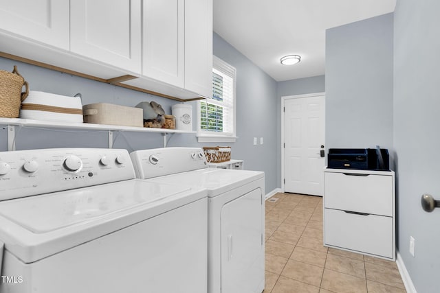 76 Bergeson Ct, Fuquay Varina, NC 27526 - washroom with cabinet space, washing machine and clothes dryer, baseboards, and light tile patterned flooring