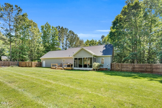 76 Bergeson Ct, Fuquay Varina, NC 27526 - rear view of property with a sunroom and a wooden deck
