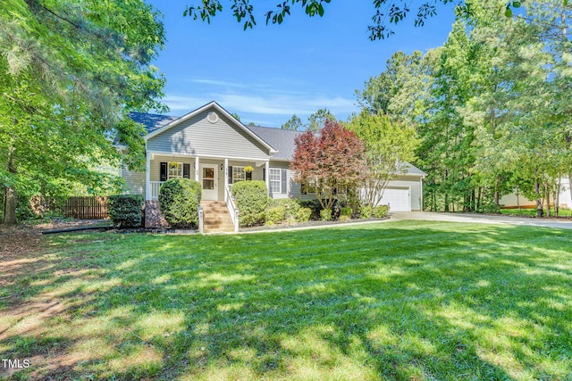 76 Bergeson Ct, Fuquay Varina, NC 27526 - view of front of house featuring driveway, an attached garage, and a porch