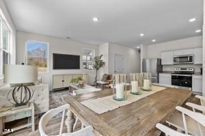 dining space with recessed lighting