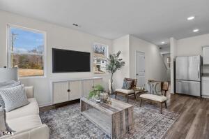 living area featuring recessed lighting and wood finished floors