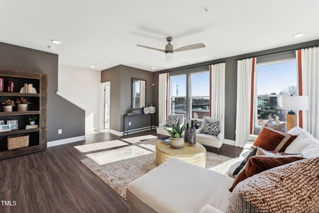 living room with baseboards, a ceiling fan, wood finished floors, and recessed lighting